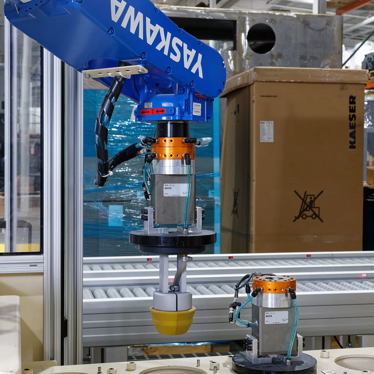 Robotic turbine blade grit blast with conveyor | Progressive Surface